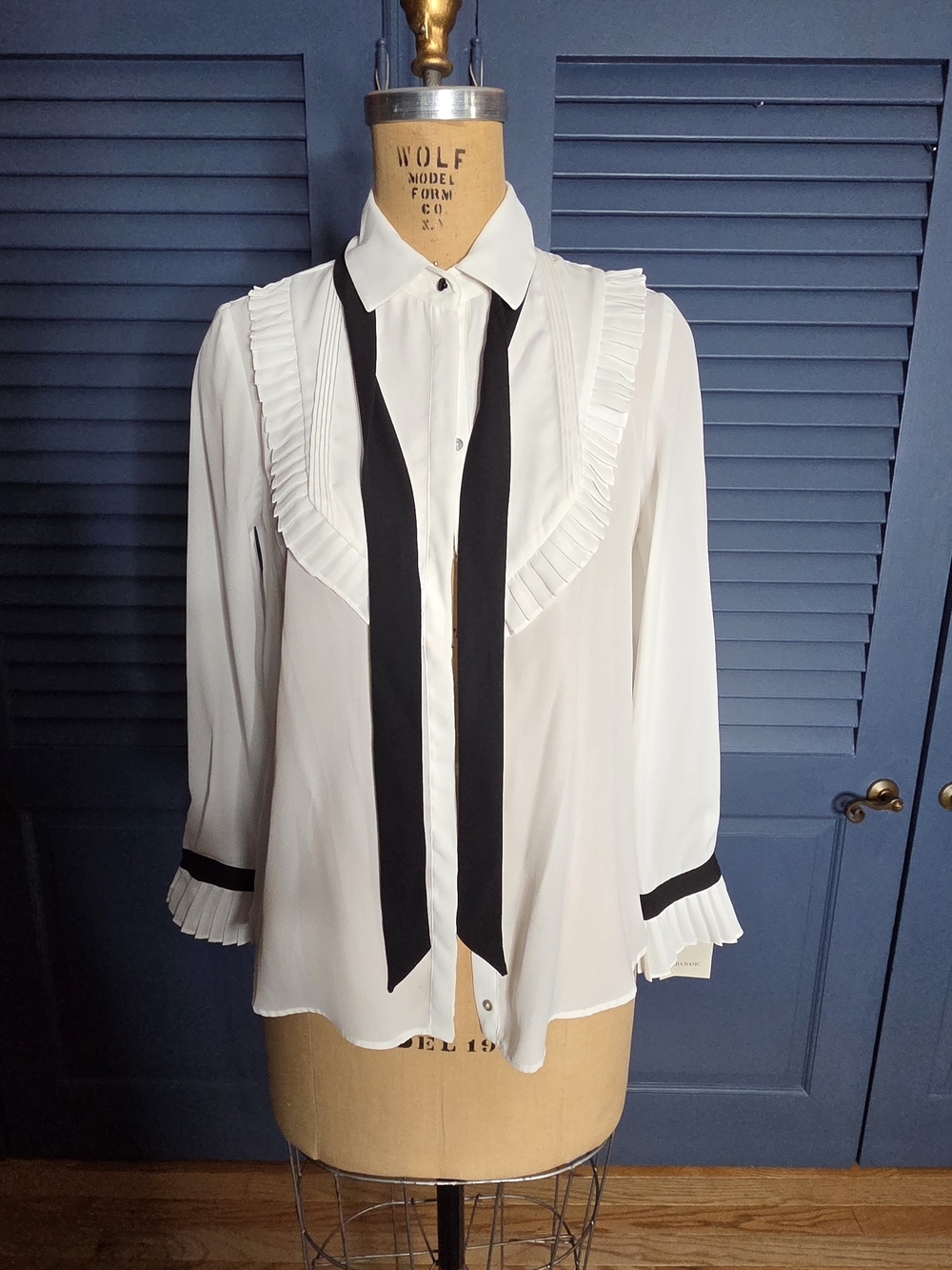Zara White Ruffle Blouse with Black Tie and Cuff Trim